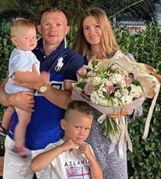 Julia Yan with her husband Petr Yan and children.